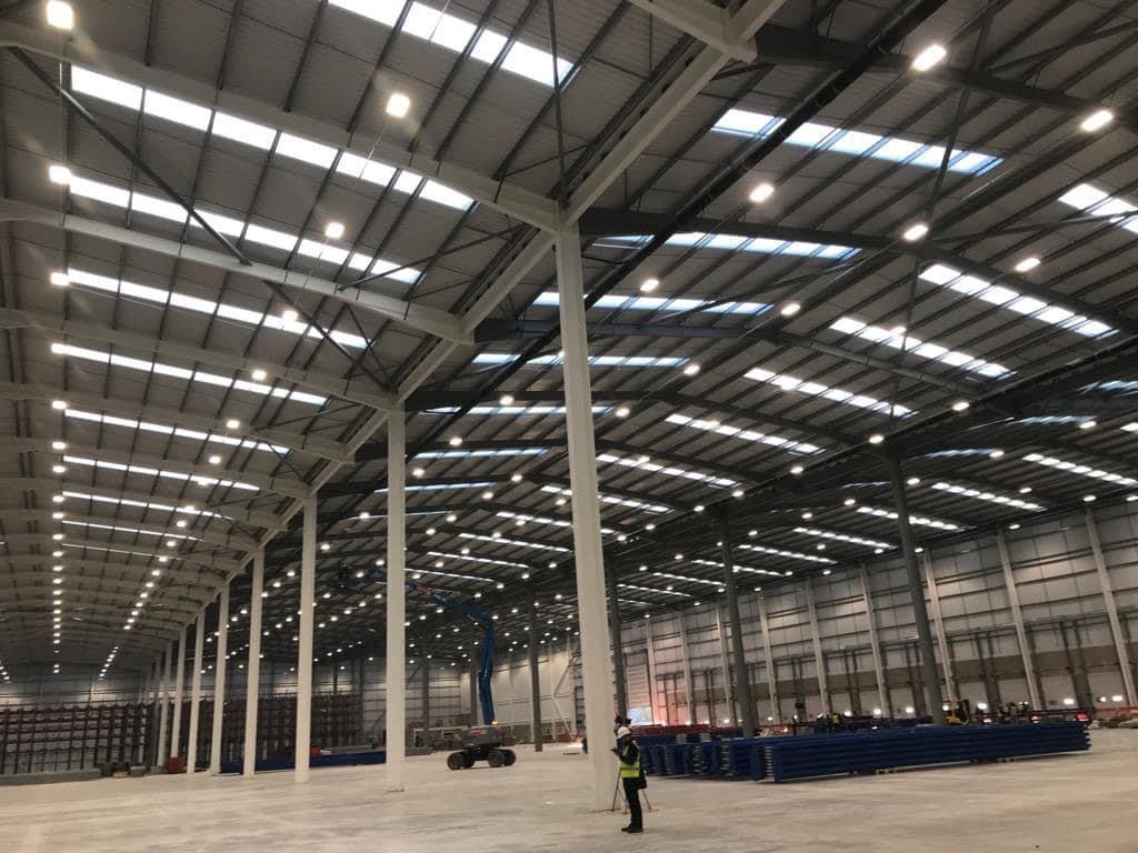 new-build warehouse electrical installation, LED high-bay lighting across the floor